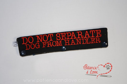 One Leash Sleeve embroidered with the following on both sides of the sleeve:       Do Not Separate Dog From Handler      Example in the listing photo has the following color selections:        • black fabric, red (1637) text.