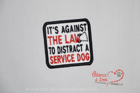 It's against the law to distract a Service Dog with cuffs embroidered, 2.5 x 2.5  inch rectangular patch