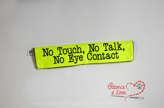 One Leash Sleeve embroidered with the following on both sides of the sleeve:        No Touch, No Talk, No Eye Contact     Example in the listing photo has the following color selections:        • Bright yellow fabric, black (1800) text.
