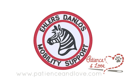 One sew on patch embroidered with the following:  EHLERS DANLOS-MOBILITY SUPPORT around the top and bottom  A zebra is embroidered in the center. As seen in the listing photo.   As seen in the listing photo. The listing photo example shows white fabric, red (1637) edge and black text.