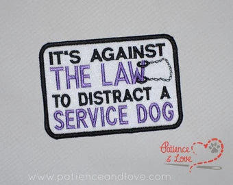 It's against the law to distract a service dog, cuffs, 4 x 2.8" rectangle patch