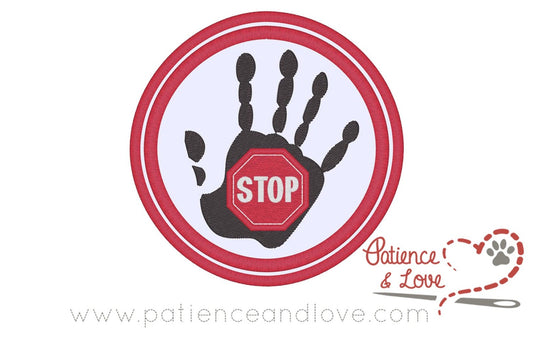 Hand with stop sign in palm, 4-inch round patch