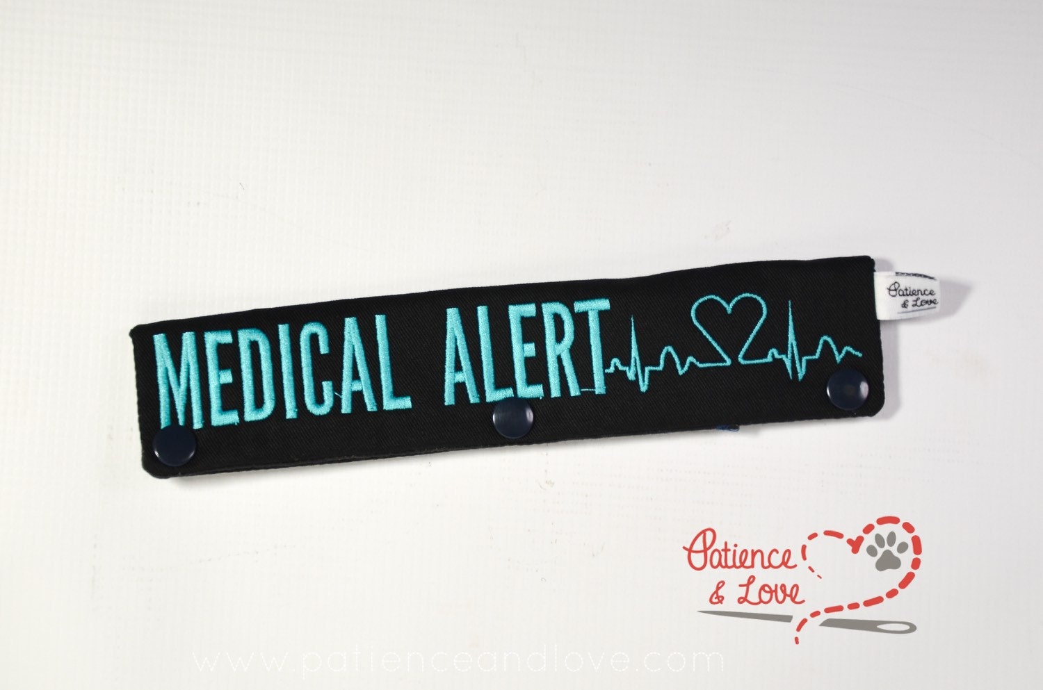 One Leash Sleeve embroidered with Medical Alert and the heart EKG on both sides. As seen in the listing photo.   Listing photo shows black fabric with aqua 1799 thread.