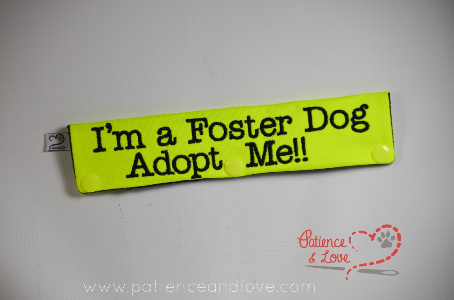 One Leash Sleeve embroidered with the following on both sides of the sleeve:       I'm a Foster Dog, Adopt Me      Example in the listing photo has the following color selections:        • Bright yellow fabric, black (1800) text.