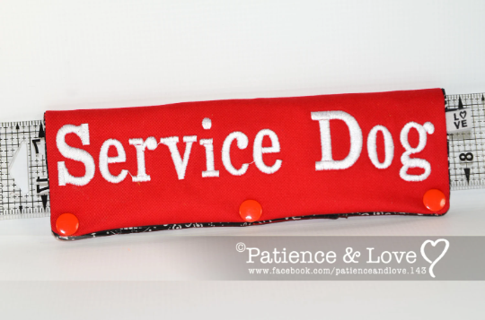 One Leash Sleeve embroidered with the following on both sides of the sleeve:       Service Dog     Example in the listing photo has the following color selections:        • Red fabric, white (1805) text.